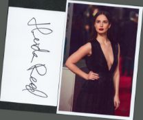 Heida Reed signed white card with unsigned 6x4inch colour photo. Good condition. All autographs come
