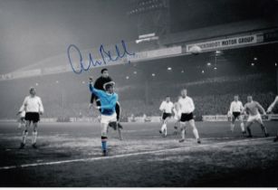 Autographed COLIN BELL 12 x 8 Photo : Colorized, depicting Manchester City`s COLIN BELL scoring