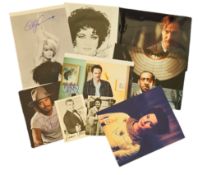 Celebrity signed photos collection. Includes Sean Connery, Elizabeth Taylor & Jonny Depp plus