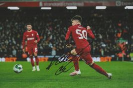 Ben Doak signed 12x8 colour photo. Pictured playing for Liverpool. Good condition. All autographs