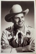 Gene Autry signature piece with black and white photo. Photo measures 4x6" appx. Good condition. All
