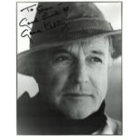 Gene Kelly signed black and white photo. Dedicated. Measures 8"x10" appx. Good condition. All