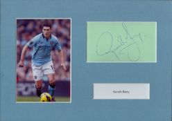 Gareth Barry framed signature piece with colour photo. Measures 12"x8" appx. Good condition. All