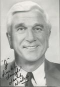 Leslie Nielsen signed 8x6 black and white photo. Good condition. All autographs come with a