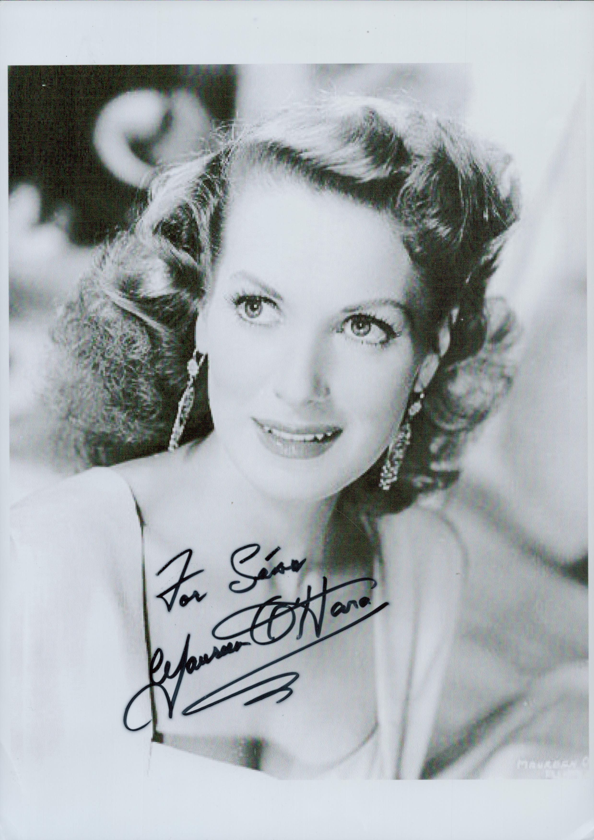 Maureen O'Hara signed 12x8 inch black and white photo. Good condition. All autographs come with a