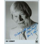 Ray Conniff signed 10x8 inch black and white promo photo dedicated. Good condition. All autographs