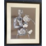 Evander Holyfield signed 20x16 mounted and framed black and white photo. Good condition. All