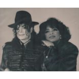 Oprah Winfrey signed black & white photo taken with Michael Jackson unsigned 10x8 Inch. Is an