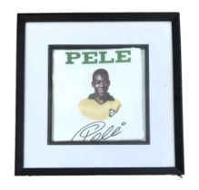 Pele signed pennant. Mounted and framed to approx size 12x12inch. Few knocks to frame but not