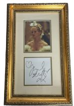 Jennifer Ellison signed mounted and framed colour photo with signature below. Measures 18x11.