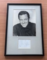 William Holden signed mounted and framed black and white photo with signature below. Good condition.