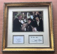 Simon Callow and Ciaran Hinds signed mounted and framed Phantom of The Opera. Measures 18"x18" appx.