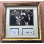 Simon Callow and Ciaran Hinds signed mounted and framed Phantom of The Opera. Measures 18"x18" appx.