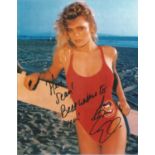 Erika Eleniak signed 10x8 inch Baywatch colour photo. Good Condition. All autographs come with a