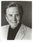 Kirk Douglas signed 10x8 inch black and white vintage photo. Good Condition. All autographs come