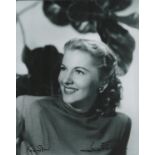 Joan Fontaine signed 10x8 inch black and white photo dedicated. Good Condition. All autographs