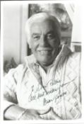 Cesar Romero signed 10x7 inch black and white photo dedicated. Good Condition. All autographs come