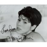 Marisa Tomei signed black & white 10x8 Inch. Is an American actress. She gained prominence for her