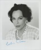 Leslie Caron signed 10x8 inch black and white photo. Good Condition. All autographs come with a