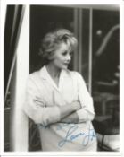 Lucille Ball signed 10x8 inch black and white photo dedicated. Good Condition. All autographs come