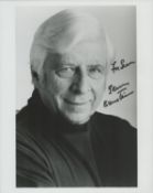 Elmer Bernstein signed 10x8 inch black and white photo dedicated. Good Condition. All autographs