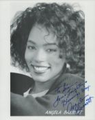 Angela Bassett signed 10x8 inch black and white promo photo dedicated. Good Condition. All