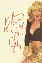 Kylie Minogue 22x15 inch signed colour poster. Good Condition. All autographs come with a