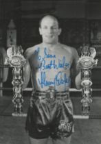 Henry Cooper signed 6x4 inch black and white photo dedicated. Good Condition. All autographs come