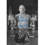 Henry Cooper signed 6x4 inch black and white photo dedicated. Good Condition. All autographs come