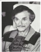 Jonathan Harris signed 10x8 inch black and white photo dedicated. Good Condition. All autographs