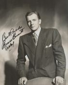 Bruce Bennett signed 10x7 inch vintage black and white photo. Good Condition. All autographs come