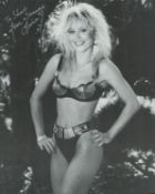 Linnea Quigley signed 10x8 inch black and white photo dedicated. Good Condition. All autographs come