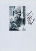 Bert Reynolds signed 12x8 inch black and white photo page dedicated. Good Condition. All