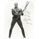 Woody Strode signed 10x8 inch black and white photo dedicated. Good Condition. All autographs come