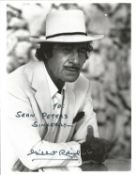 Gilbert Roland signed 10x8 inch black and white photo dedicated. Good Condition. All autographs come
