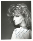 Ann Margaret signed 10x8 inch black and white photo dedicated. Good Condition. All autographs come