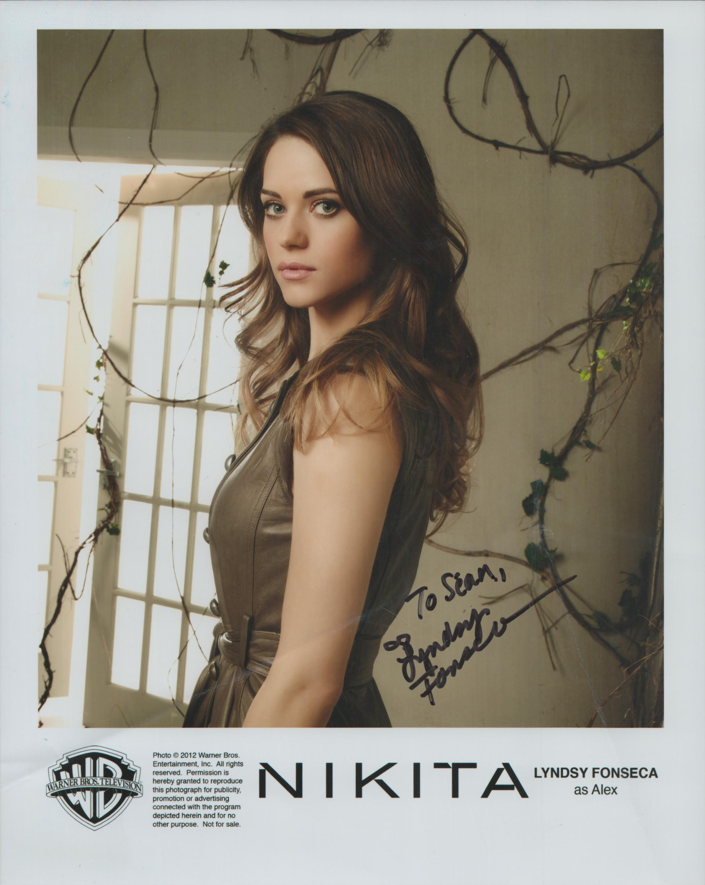 Lyndsy Fonseca signed Nikita 10x8 inch colour promo photo dedicated. Good Condition. All