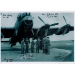 A crew in discussion stood close to a Lancaster, Black and White Photo, Signed by 5 including Eric