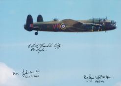 A close-up of a Lancaster in Flight pictured from alongside, Colour Photo Signed by 3 including