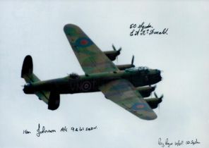 A solitary Lancaster in Flight pictured from alongside, Colour Photo Signed by 3 including E A