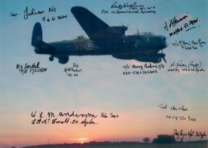 A Lancaster in low Flight at sunset, Colour Photo Signed by 11 including H J Flowers, Ted McRae,