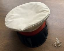 Royal Marines Dress Cap, size 6.3/4 from Tower Clothiers (UH) Ltd, with cap badge (has a broken