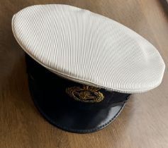 Officers and Senior Rating Class 1 cap, white with black rim and peak, Badge is an anchor with