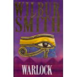 Wilbur Smith Signed Book - Warlock by Wilbur Smith 2001 hardback book with 500 pages, Signed by