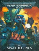 Warhammer 40,000 - Space Marines date unknown hardback book with 208 pages, good condition. Sold