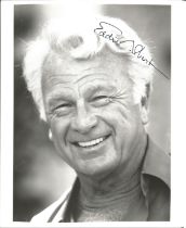 Eddie Albert signed 10x8 inch black and white photo. Good condition. All autographs come with a