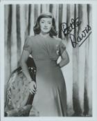 Bette Davis signed 10x8 inch black and white photo. Good condition. All autographs come with a