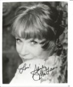 Shirley Maclaine signed 10x8 inch black and white photo. Good condition. All autographs come with