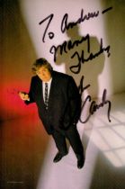 John Candy signed 9x6 inch colour photo dedicated. Good condition. All autographs come with a