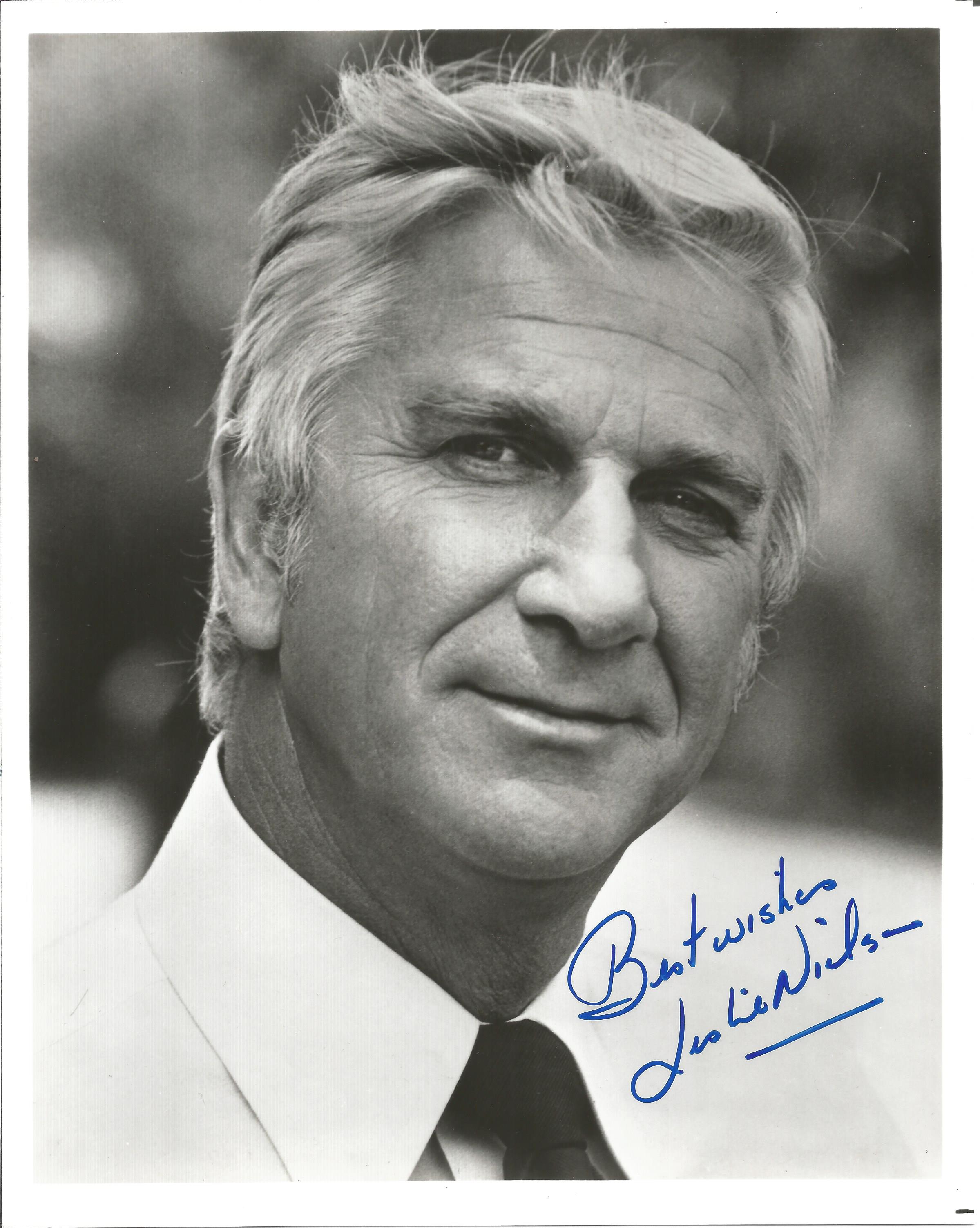 Leslie Nielsen signed 10x8 inch vintage black and white photo. Good condition. All autographs come